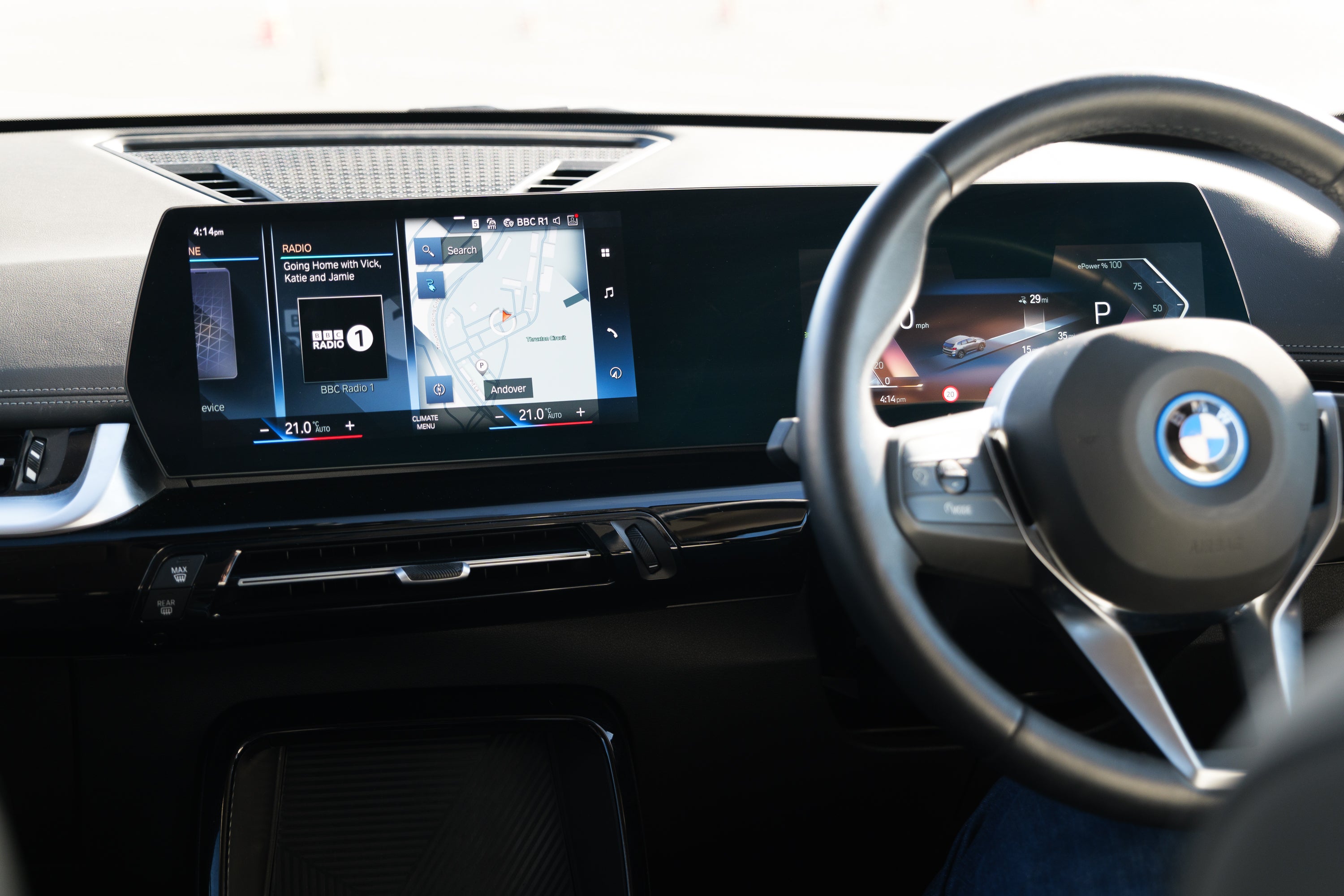 Premium in-car infotainment screen with dashboard controls