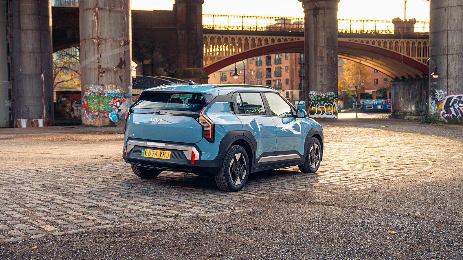 Kia EV3 static in blue, rear three quarter